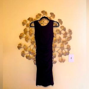 Size 38, made in Italy dress that fits in all the right places. Eggplant color